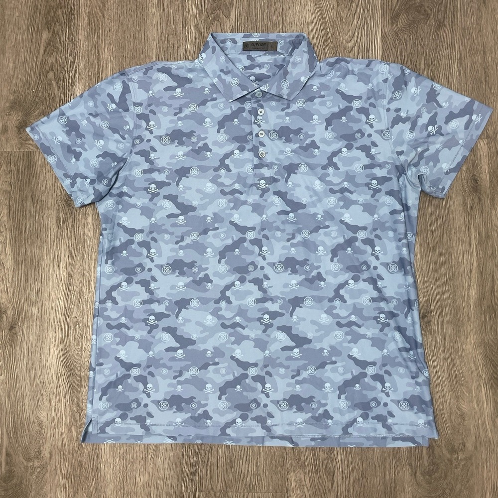 G/Fore G4 Polo Shirt Mens Large Blue Golf Skulls Allover Print Performance Tech